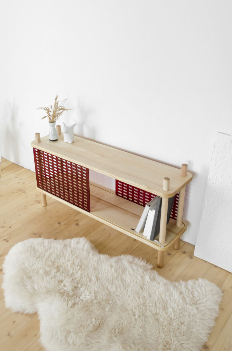 wood shelf with red panels