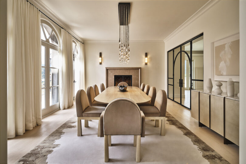 Bright and airy dining room in the Chalon Residence, featuring light-colored furnishings, neutral walls