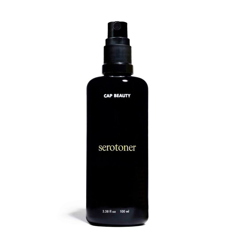 black bottle of face toner