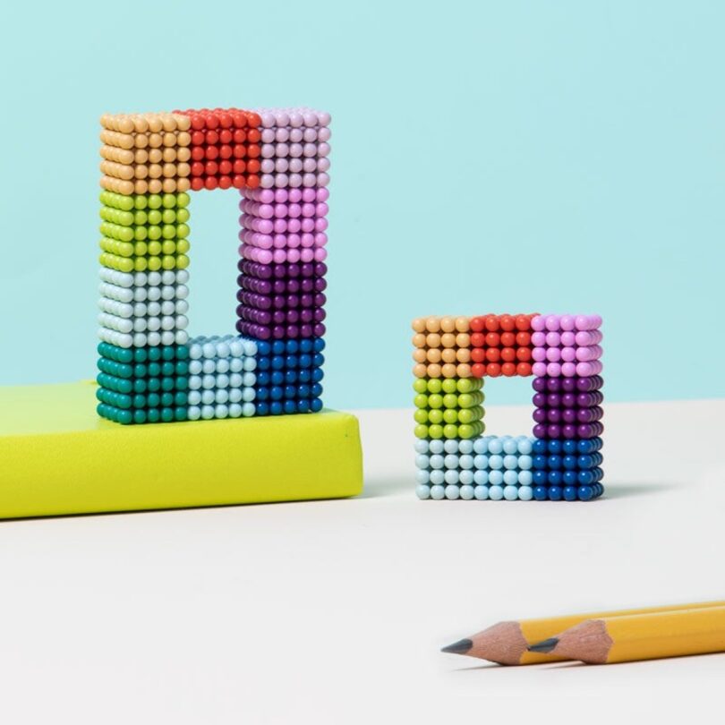 rainbow fidget toys next to pencil