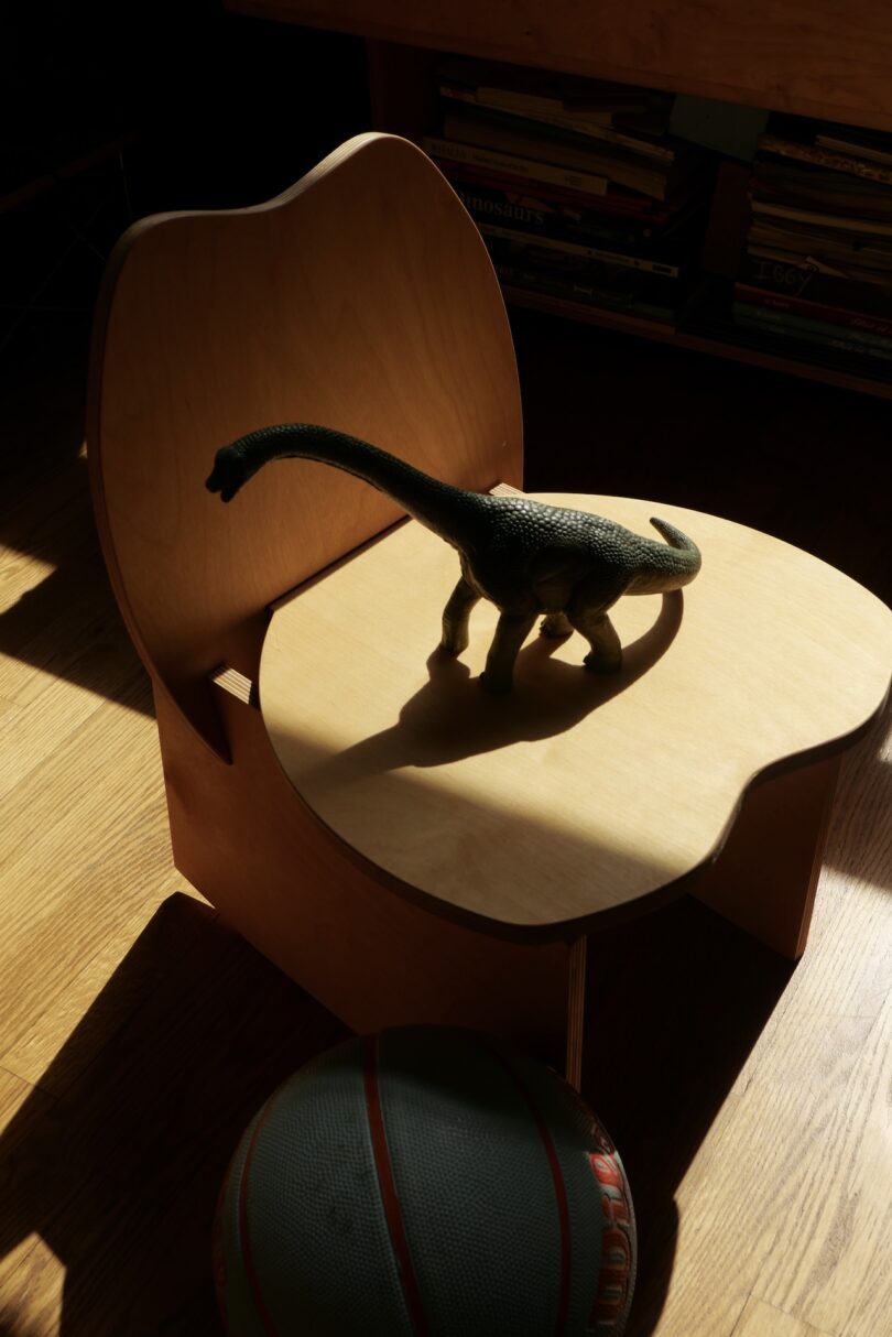 dinosaur on plywood chair