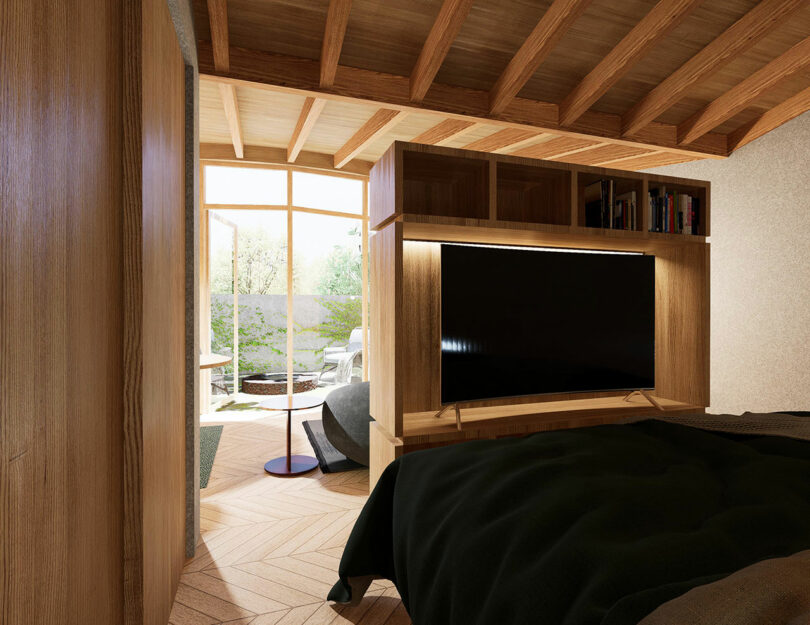 interior view from small modern bedroom with TV unit operating as room divider