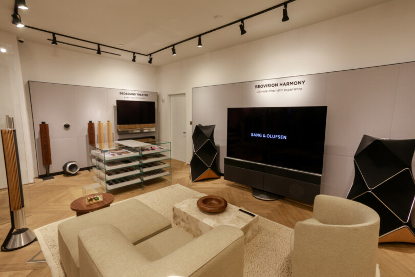 Rear space in the Bang & Olufsen showroom with large electronics.
