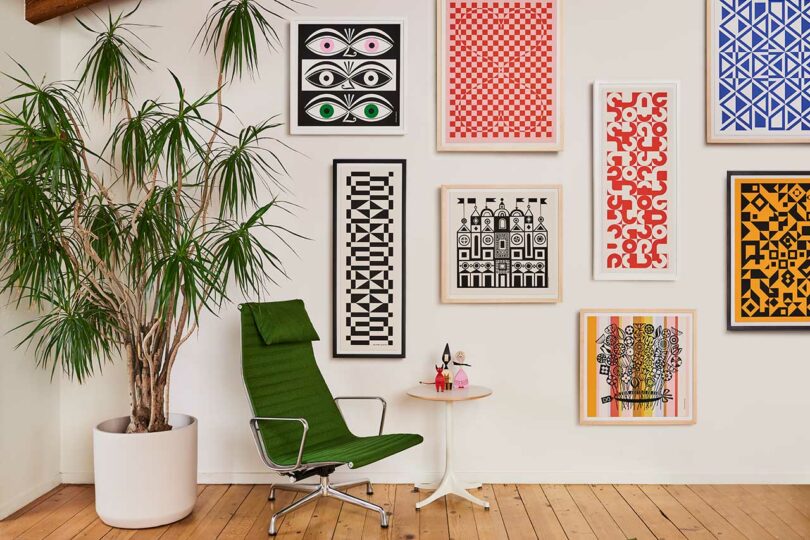 Prints hanging on the wall.