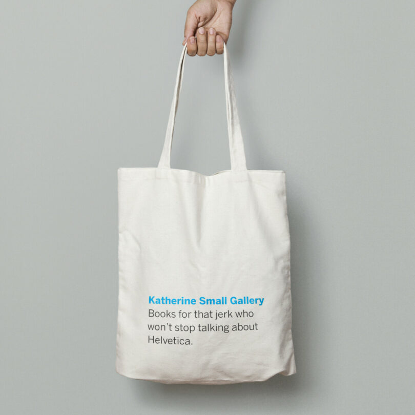 hand holding a tote bag