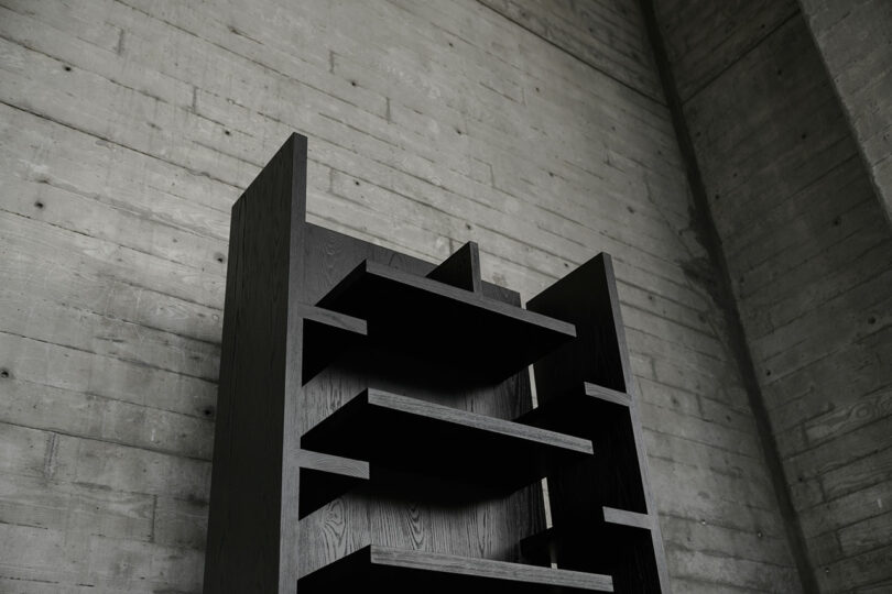 Upward detail view of black bookcase