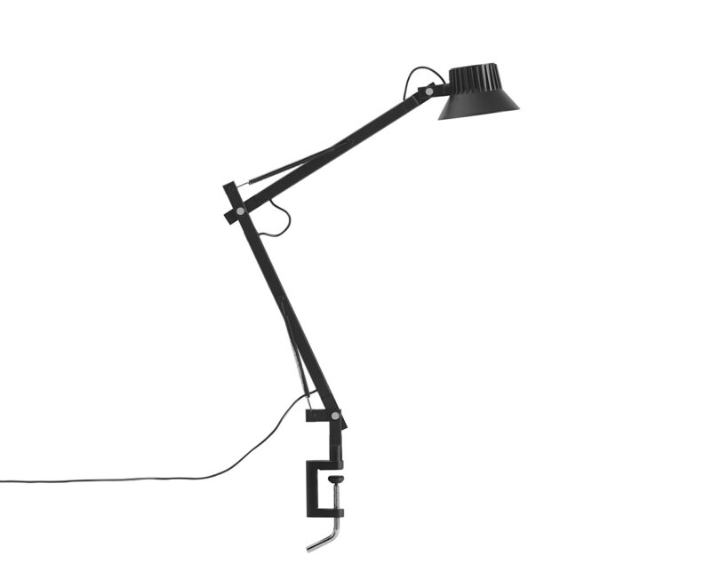 Black clamp base desk lamp with spring arm and small LED light.