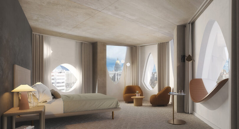 Render of one of Populous hotel's guest rooms, showing the aspen tree inspired interior and windows.