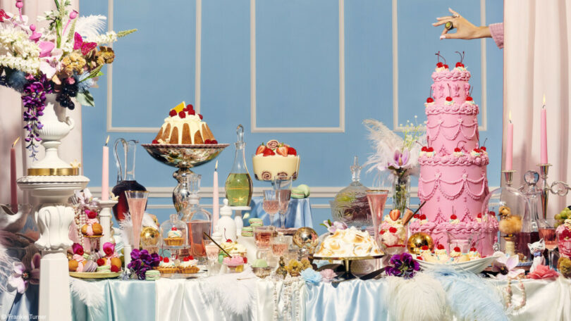 1st Place Food Stylist Award photo winner of a tablescape of cakes and other colorful desserts