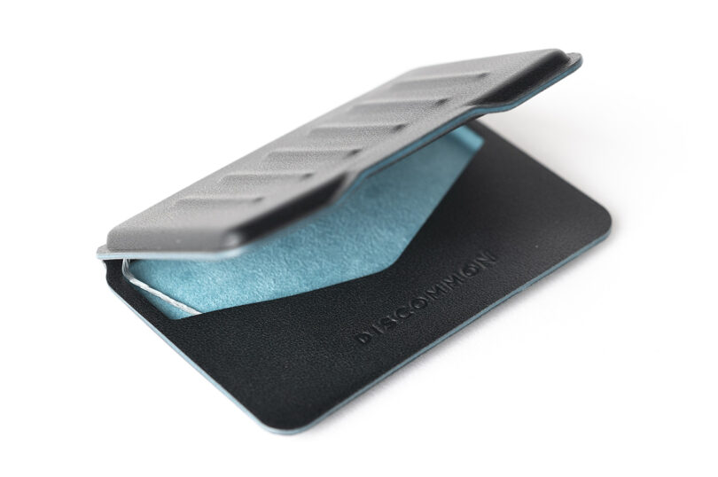 slim black wallet with cyan interior