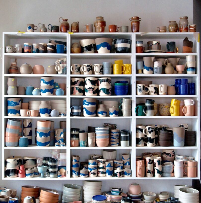 wall shelves filled with ceramics
