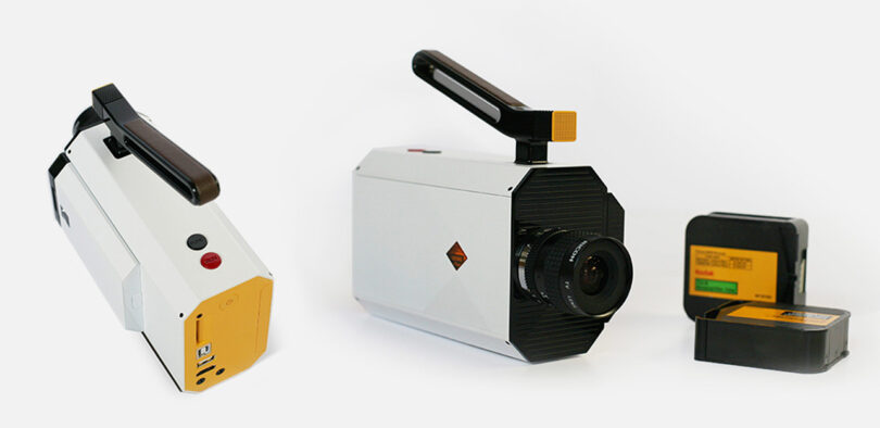 Two Kodak Super 8 Camera shown side by side, both with white case finish, staged next to two film cartridges to the left.