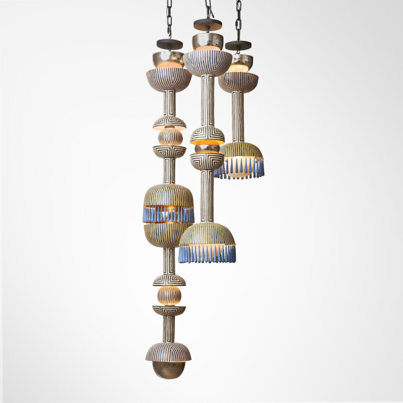 three totemic pendant lamps