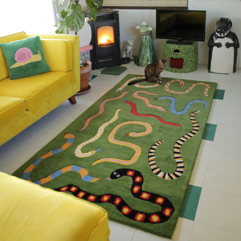 green rug with snakes in living room