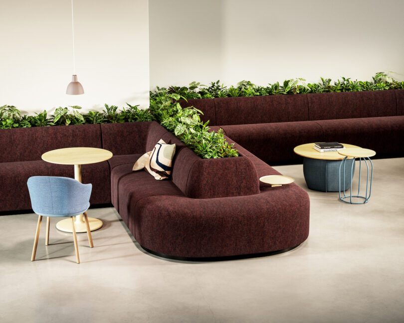 brown banquette seating with planters