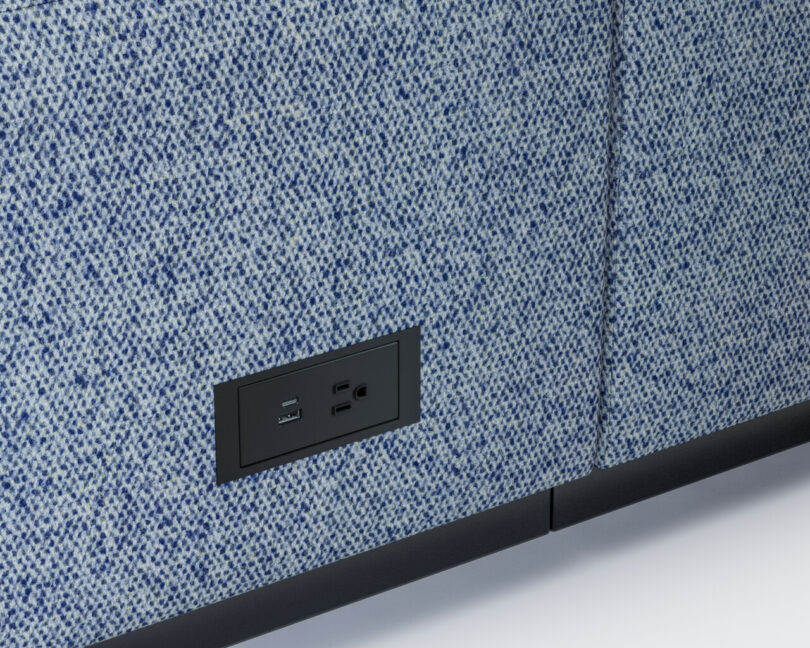 flush power outlet on blue seating 