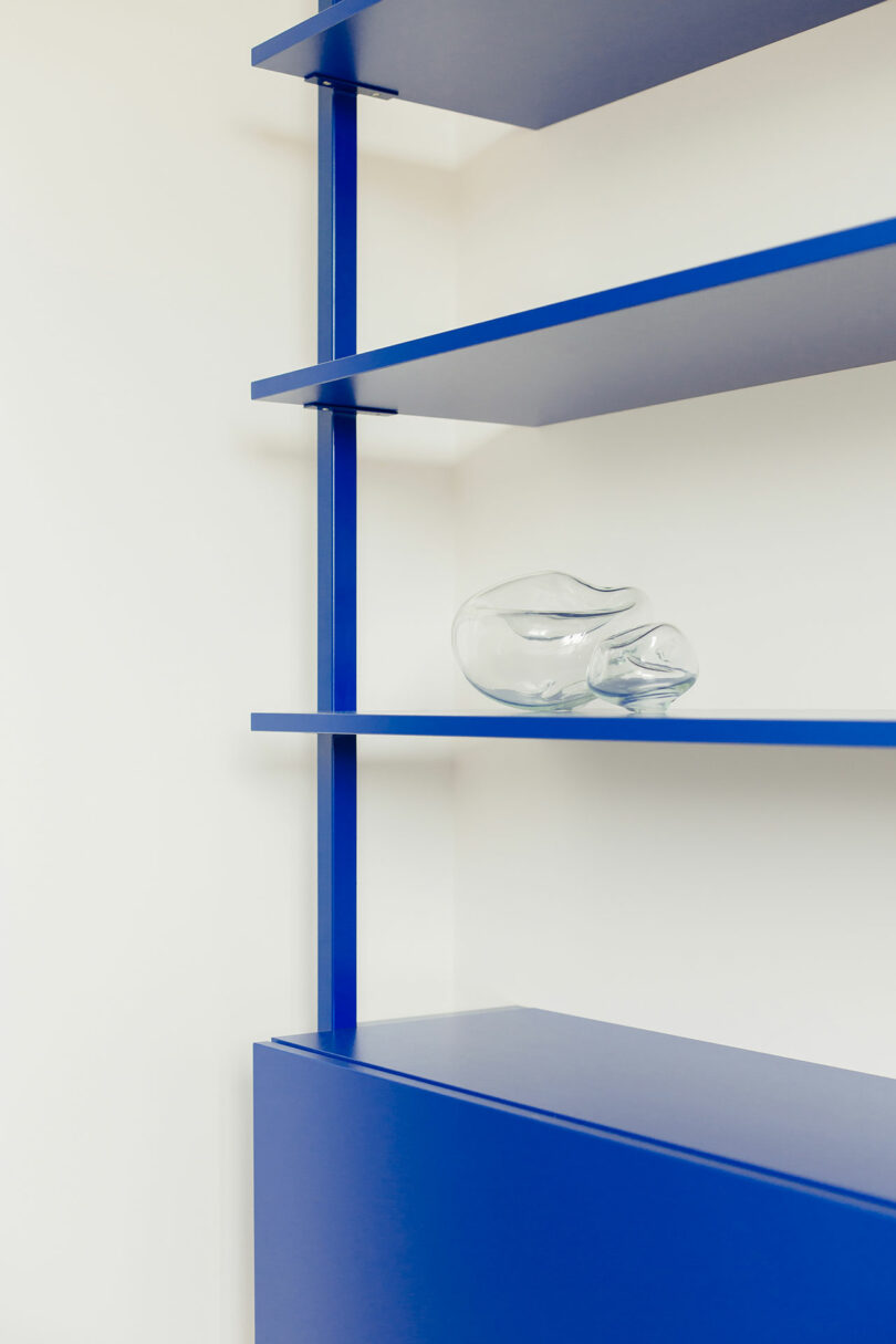 closeup angled position of agleam bluish modern wall shelf