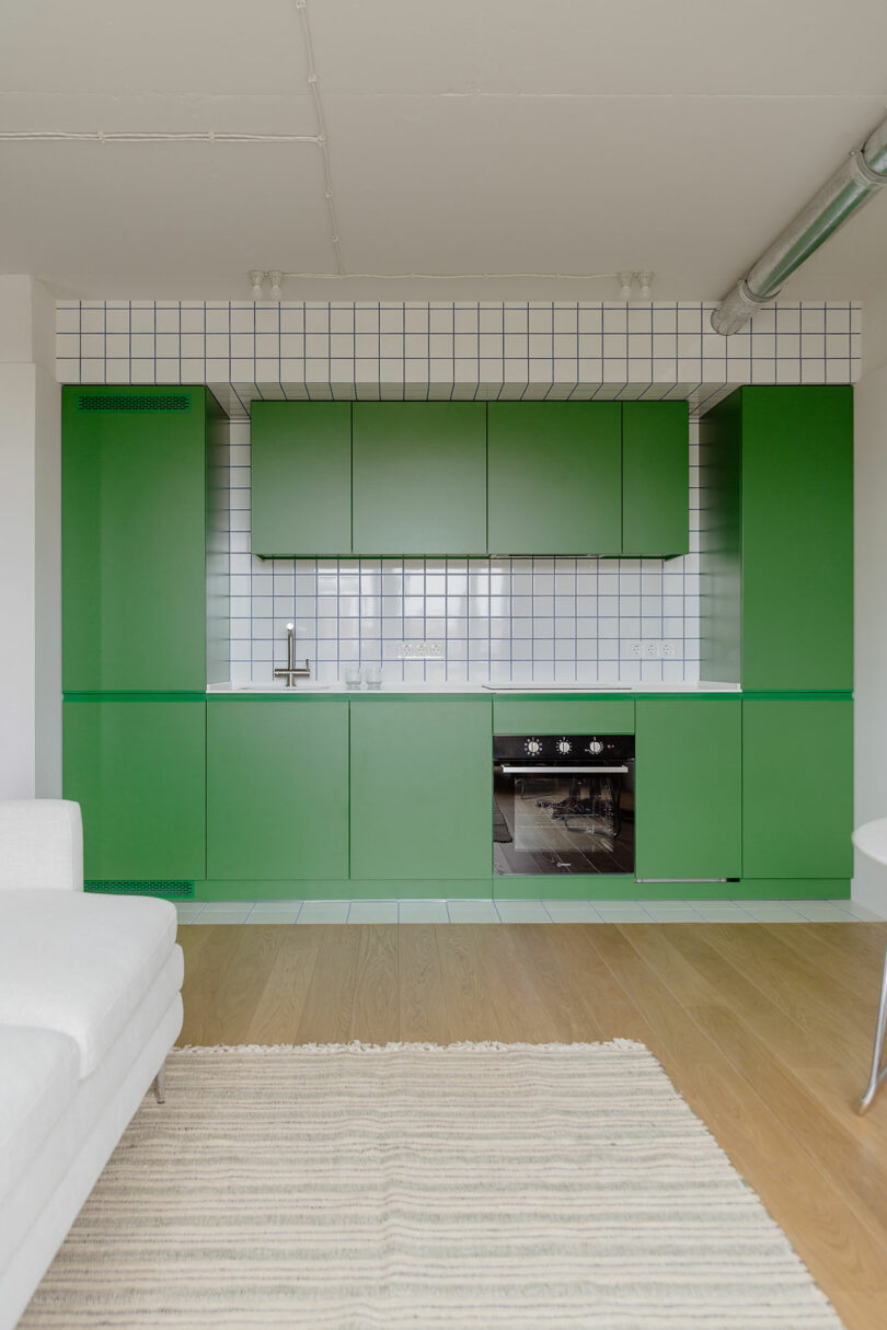 modern minimalist surviving abstraction looking towards kelly greenish kitchen