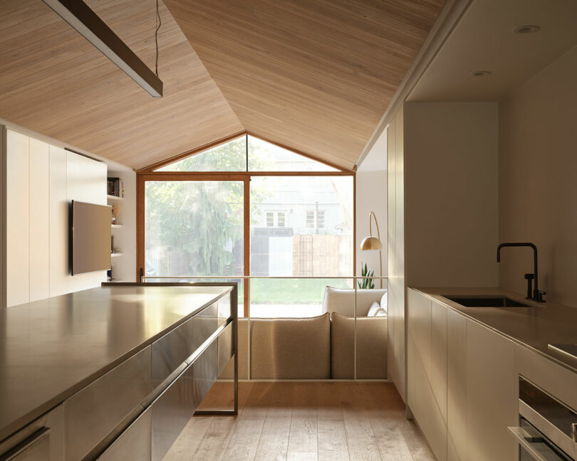 view through galley kitchen of modern house