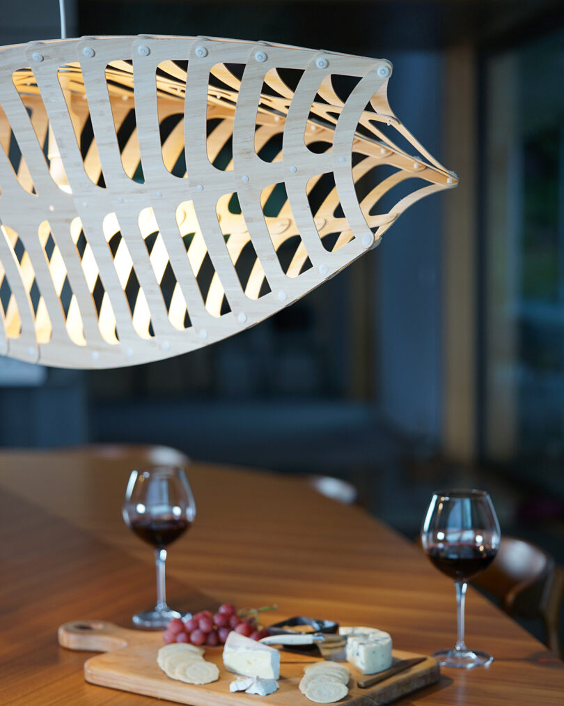 modern pendant lamp hangs complete a styled eating table