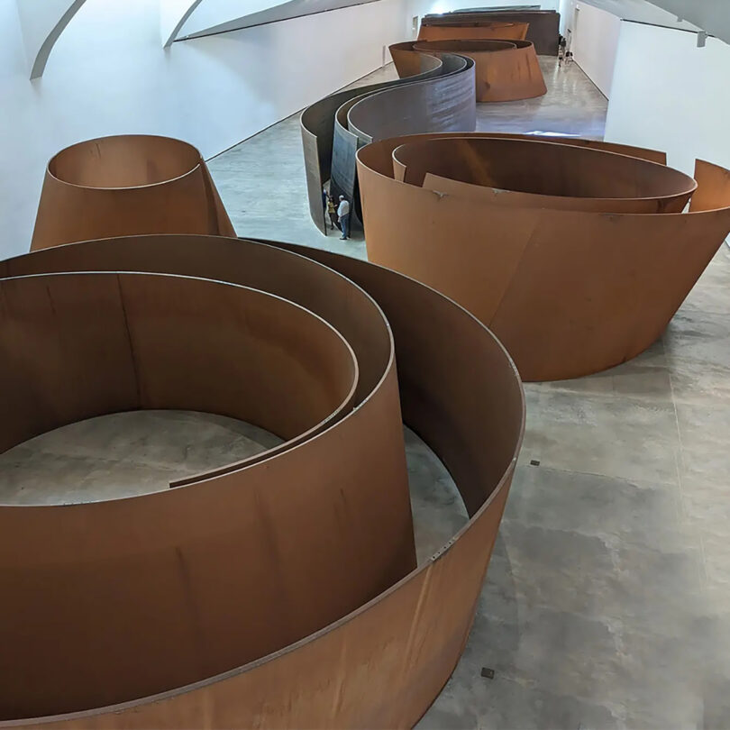 art installation of rusted concentric circles that can be walked through
