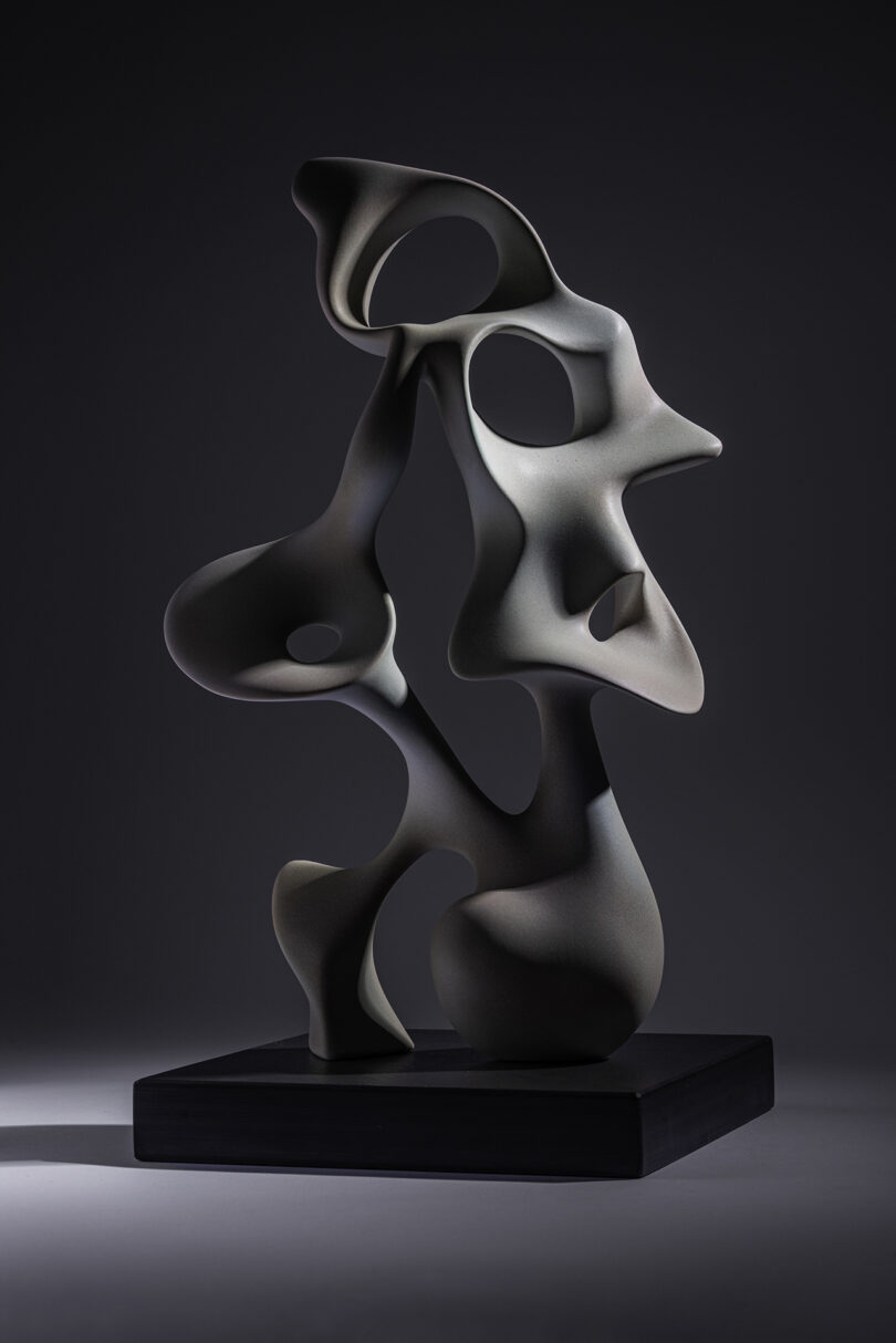 abstract white sculpture on a pedestal
