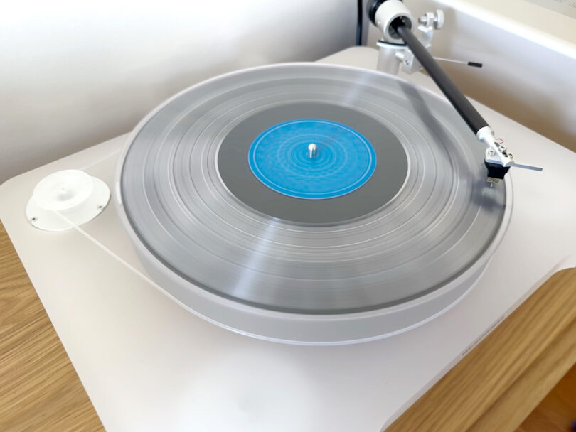 Marantz TT-15S Reference Series turntable playing record with blue center label.