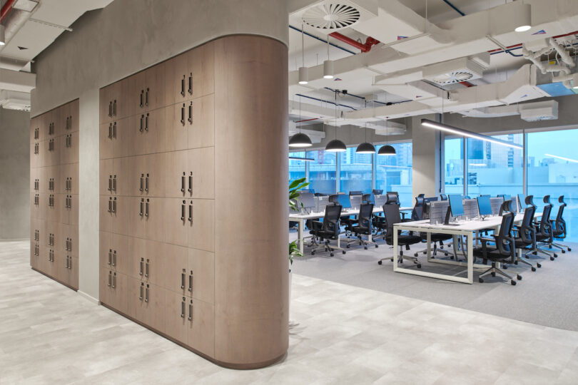 brown lockers next to workstations