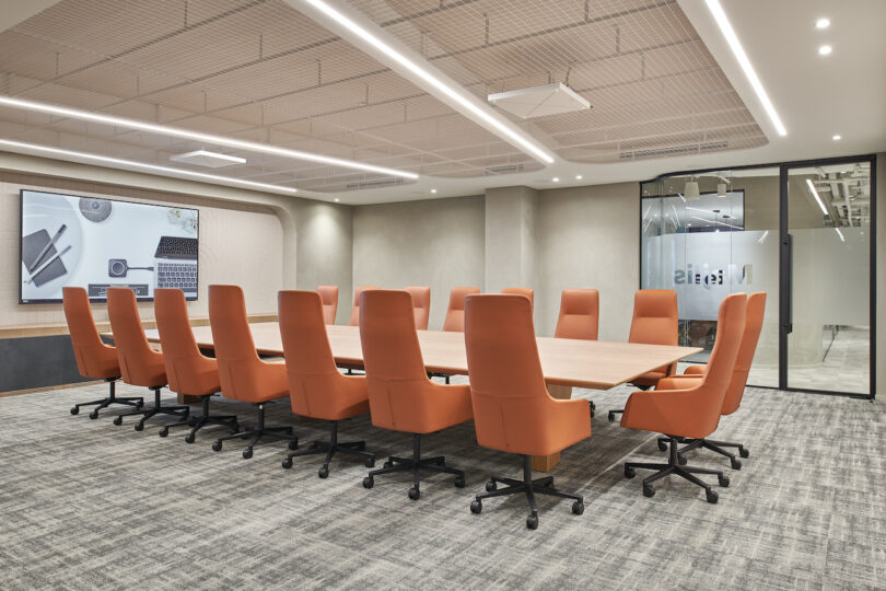 large conference room with orange chairs