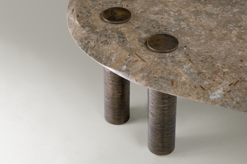 detail of metallic and marble table