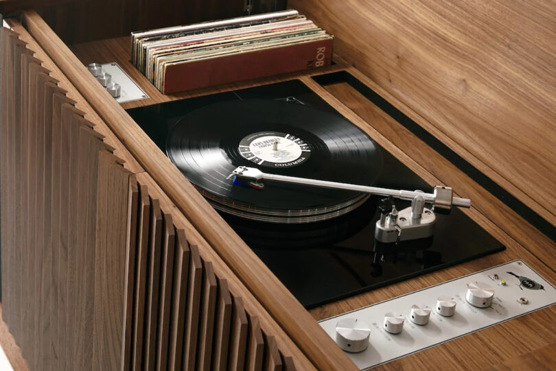 Detail of Wrensilva M1 turntable with top cover open and record on platter.