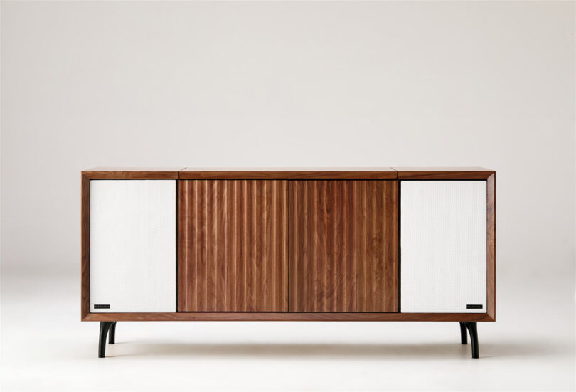 Wrensilva The Standard stereo console in Walnut finish with Black legs and White grille front.