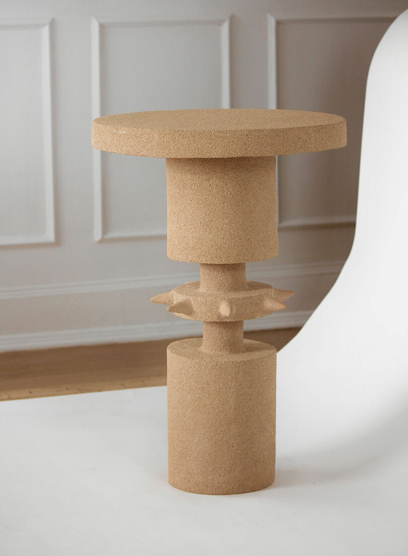 beige ceramic table with spiked ball