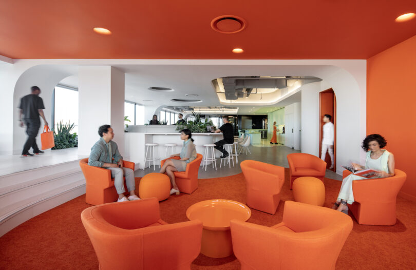 orange lounge area of modern office