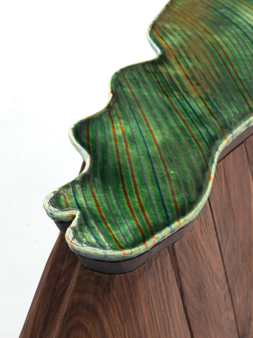 green ceramic and wood land table