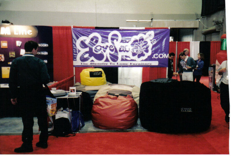 purple store banner with lovesac chairs 
