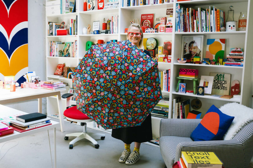 woman opinionated down colorful umbrella successful her creation studio