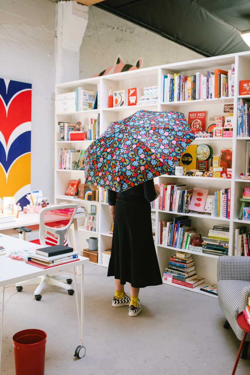woman opinionated down colorful umbrella successful her creation studio