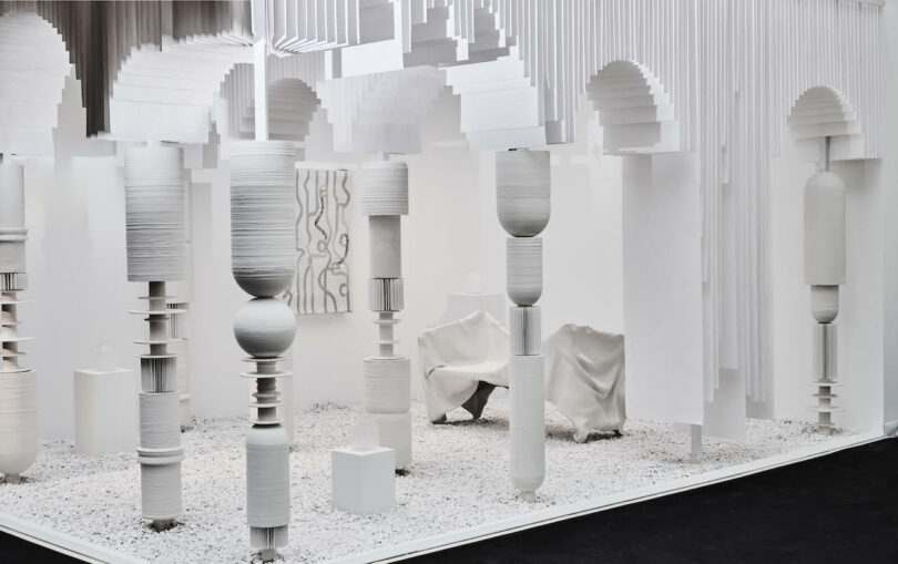 A white exhibit at Villa Albertine showcasing an array of stunning white sculptures.