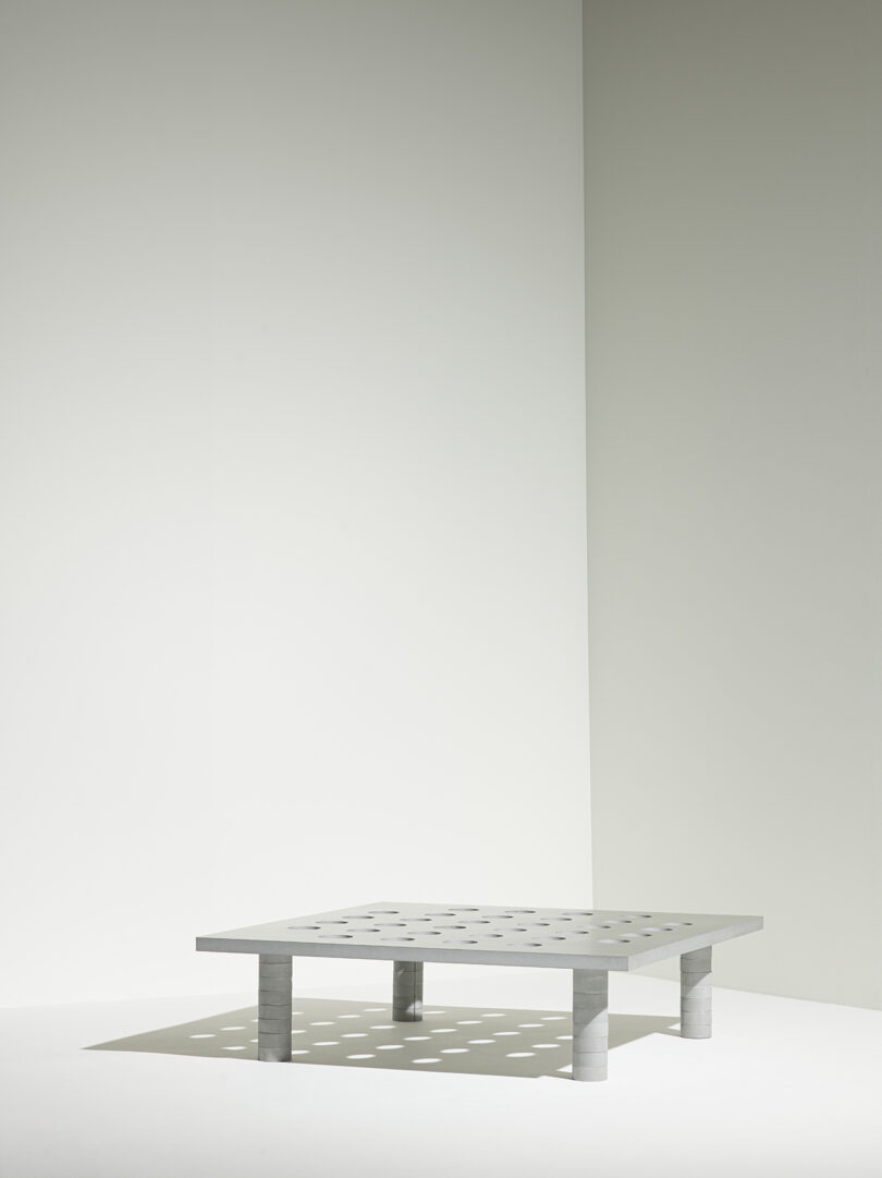 square metal coffee table with tabletop perforations