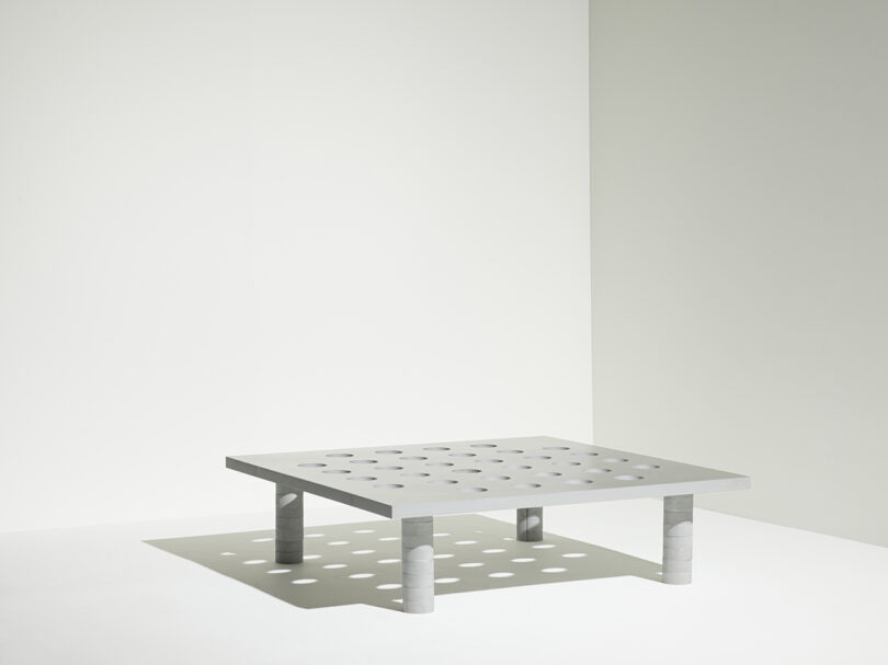 square metal coffee table with tabletop perforations
