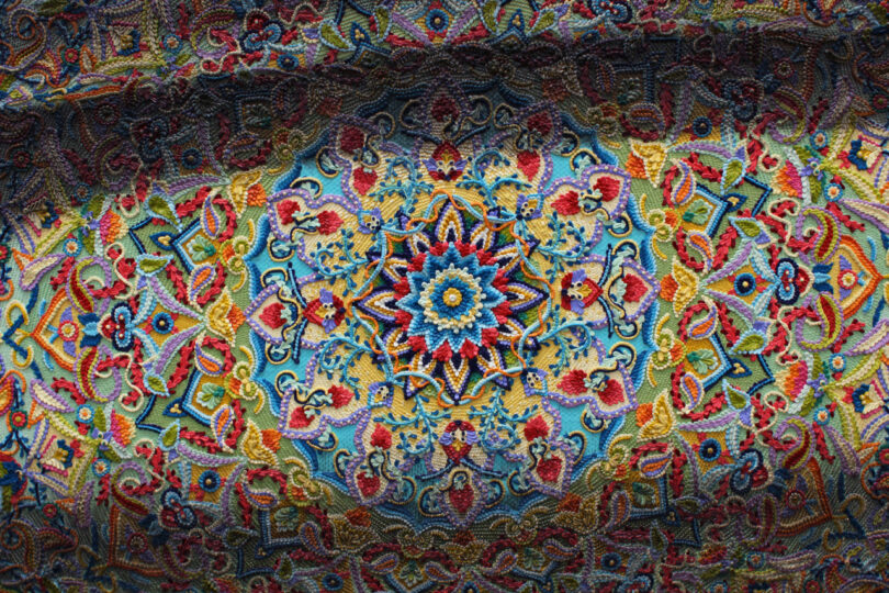 Detail of mandala-like pattern in rug painting