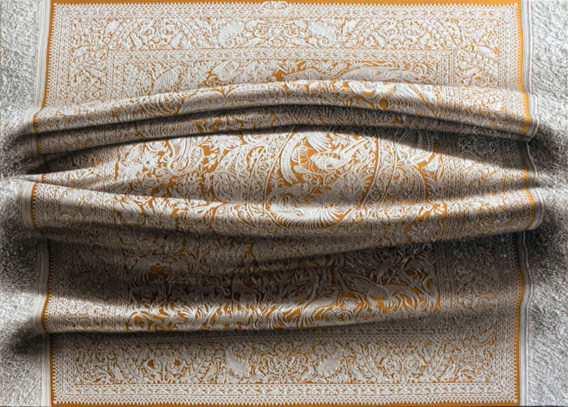 Painting of rug in gold and white