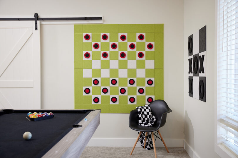 red, white, lime green, and white felt checkers game