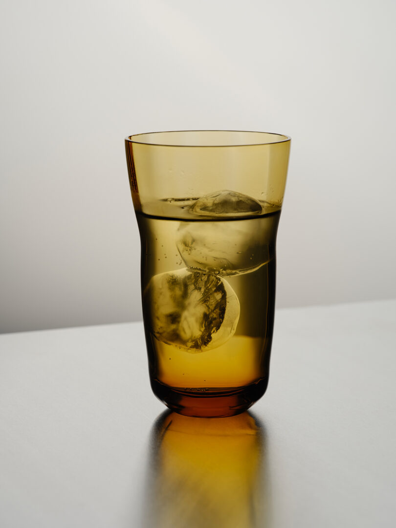 filled amber highball glass