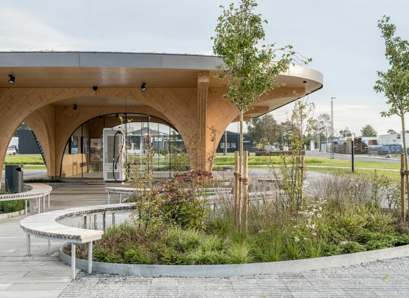 A circular building with benches and trees, perfect for a quick stop or relaxation.