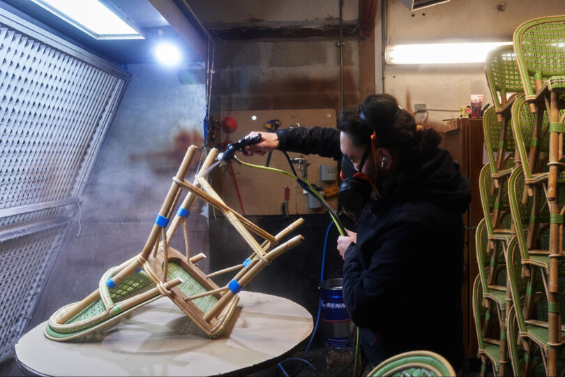 artisan working on building a cafe chair