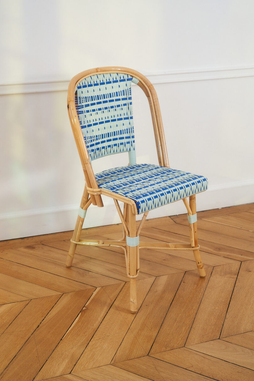blue and white caned cafe chair