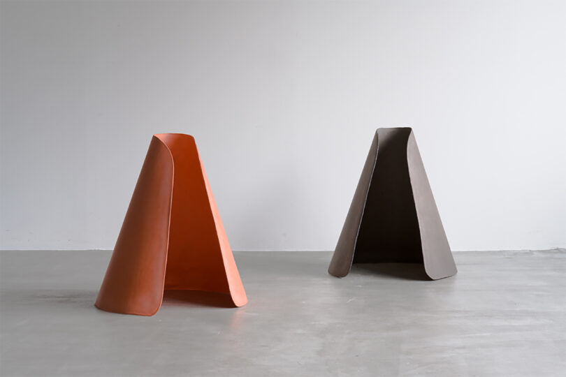 two conical light artworks