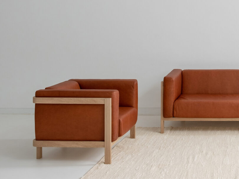modern orange leather sofa and armchair